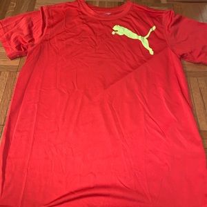 Red puma workout shirt.
